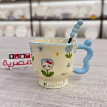 مج بورسلين بالملعقة يد بابلز رسومات أزرق