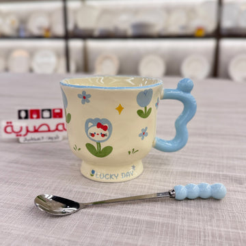 مج بورسلين بالملعقة يد بابلز رسومات أزرق